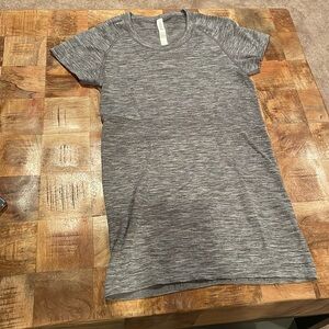 Lululemon short sleeve, hip length shirt.